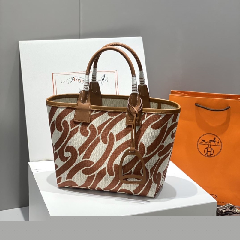 H**mes shopping bags